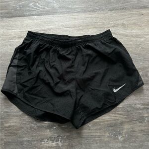 Black Nike running shorts